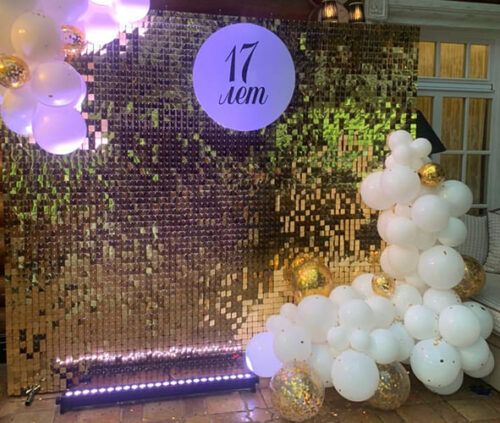 Фотозона из золотых пайеток